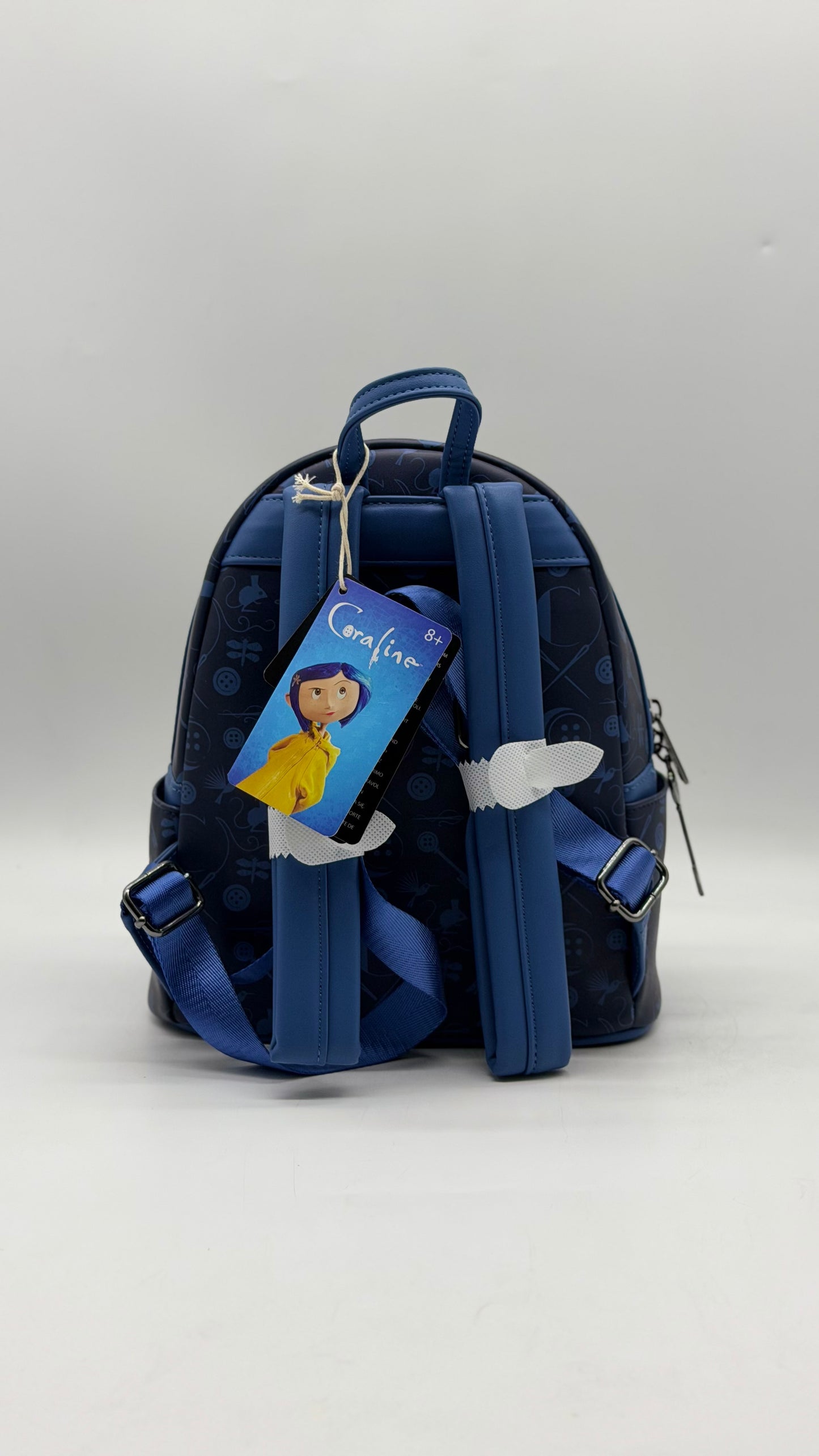 Coraline Portal Button Frame Lenticular Backpack