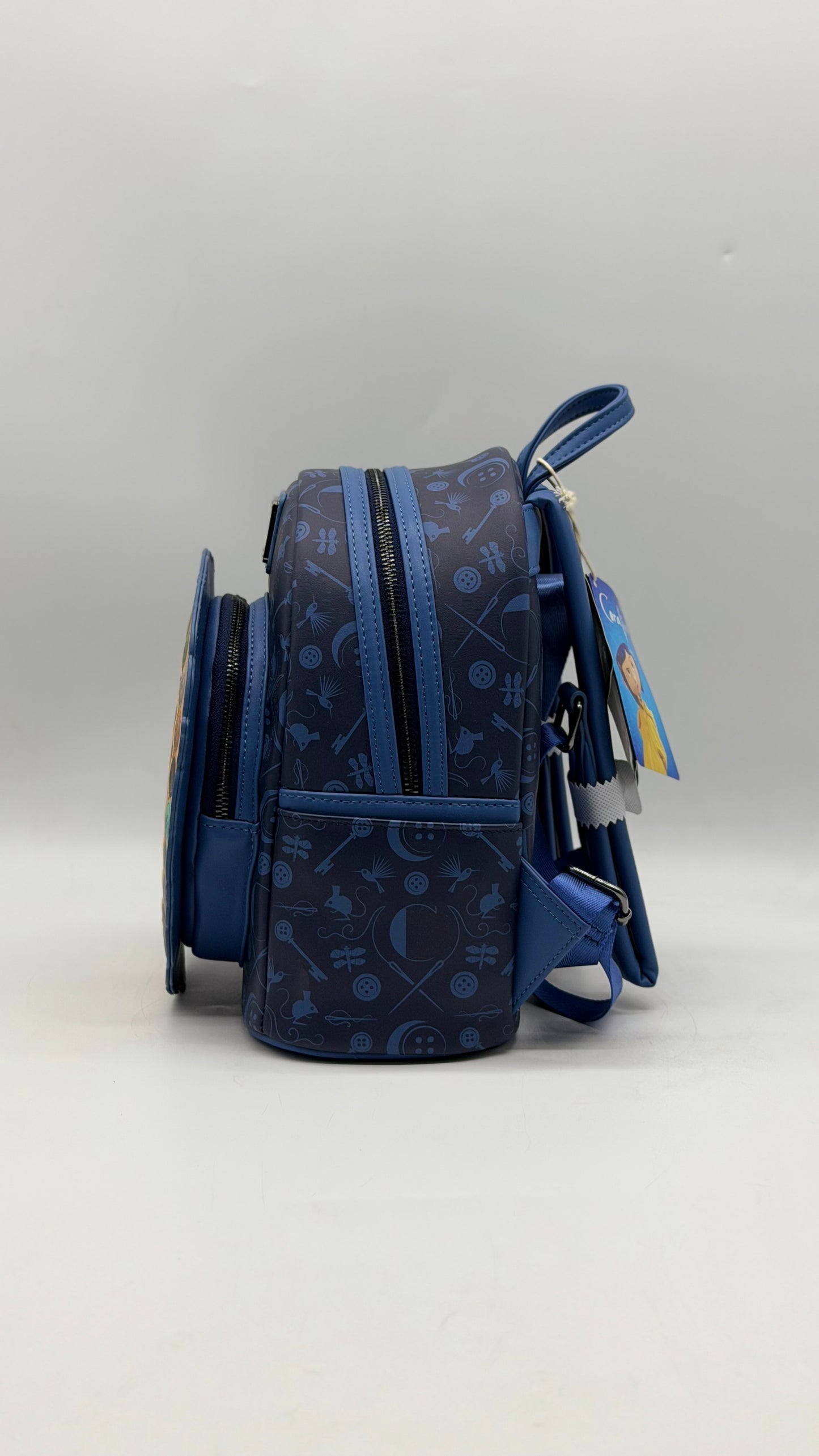 Coraline Portal Button Frame Lenticular Backpack